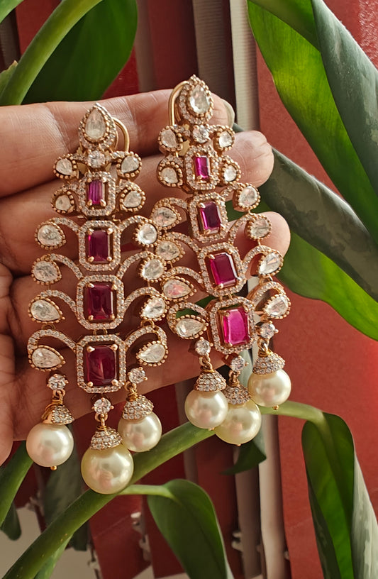 Long earrings with ruby and pearls