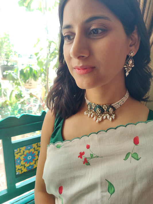 Jagavi choker set with green kemp stones on poth pearl strings