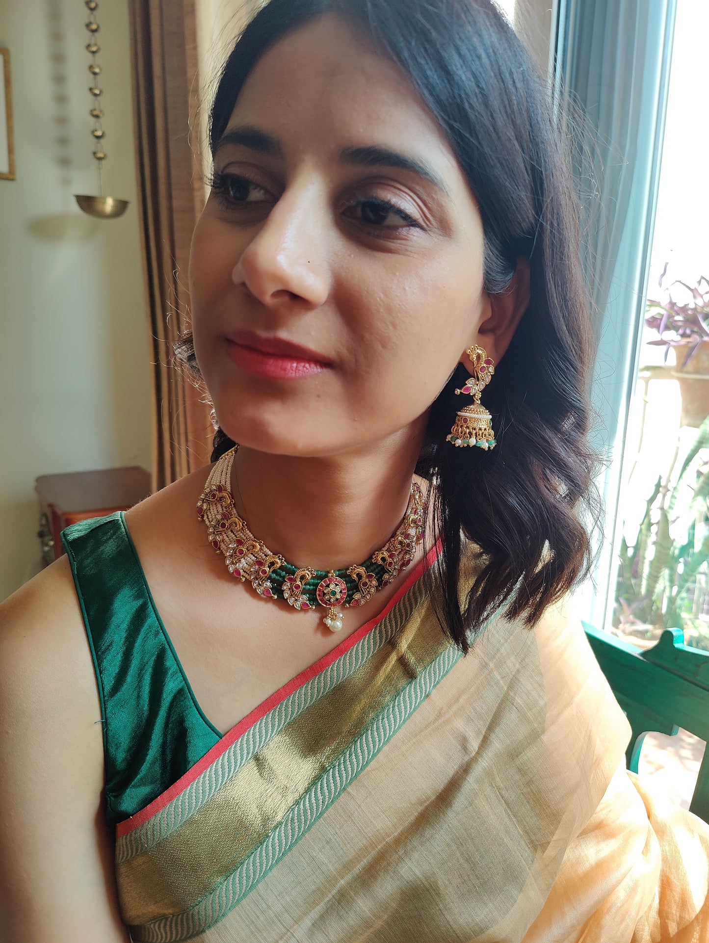 Kishori set with peacocks on poth pearl strings