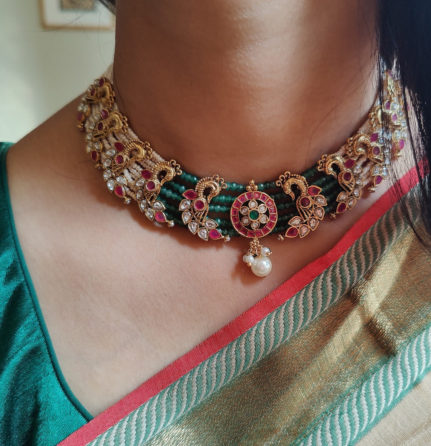 Kishori set with peacocks on poth pearl strings