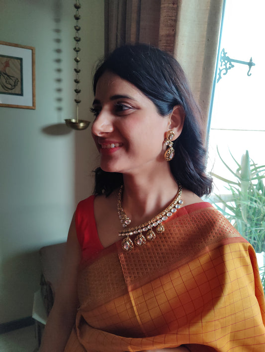 Khyati hasli set in antique finish with kundan