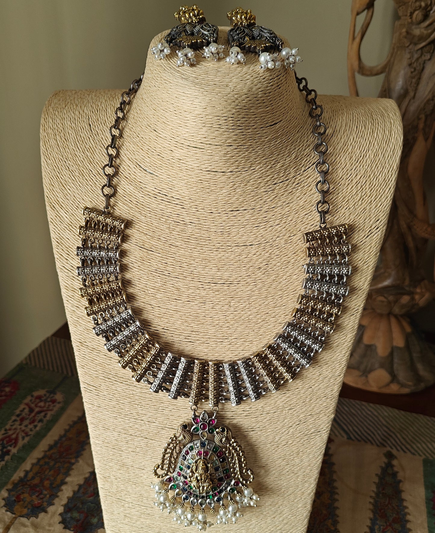 Dual tone necklace set with lakshmi pendant