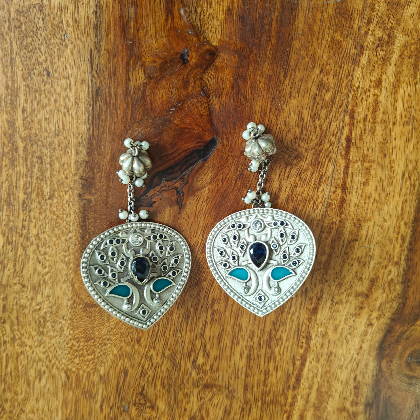 Earrings with engraving and stones
