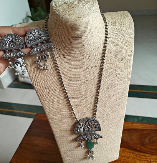Peacock pendant set with stone and engraving