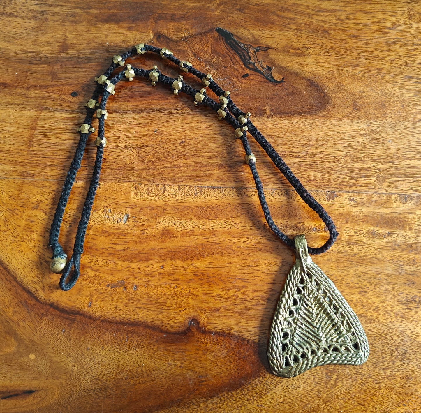 Tribal necklace with brass pendant