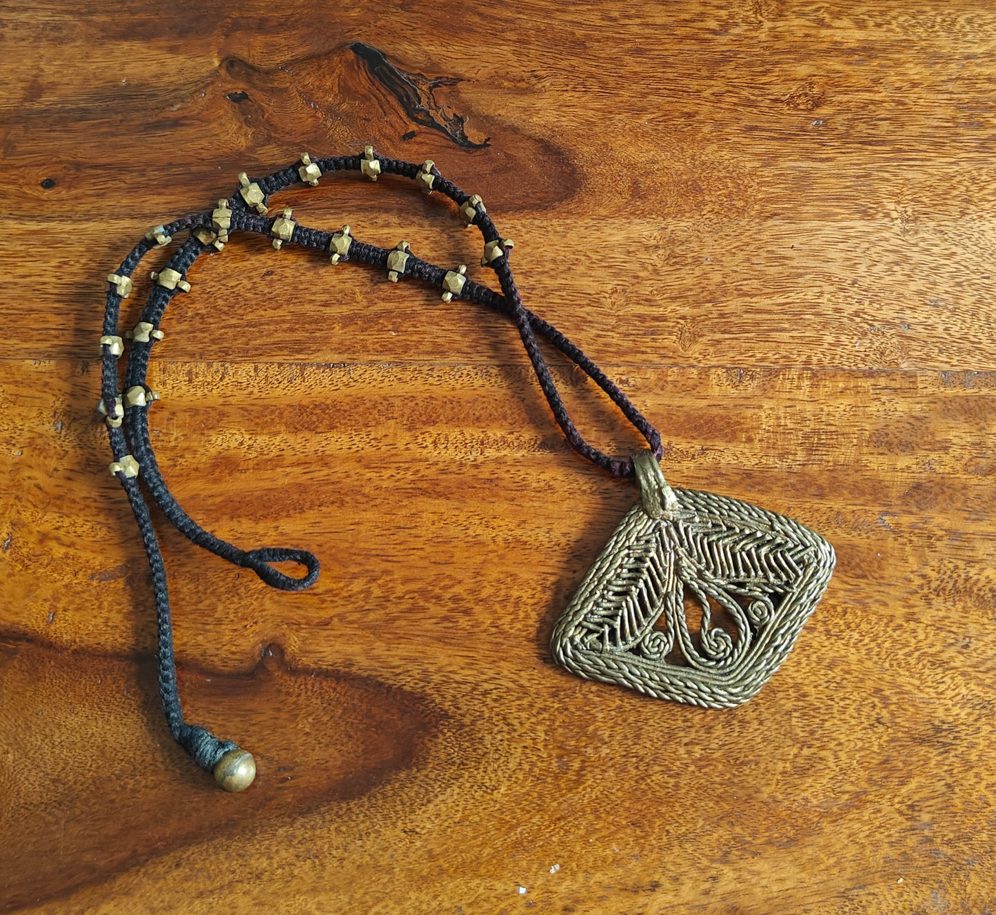 Tribal necklace with brass pendant