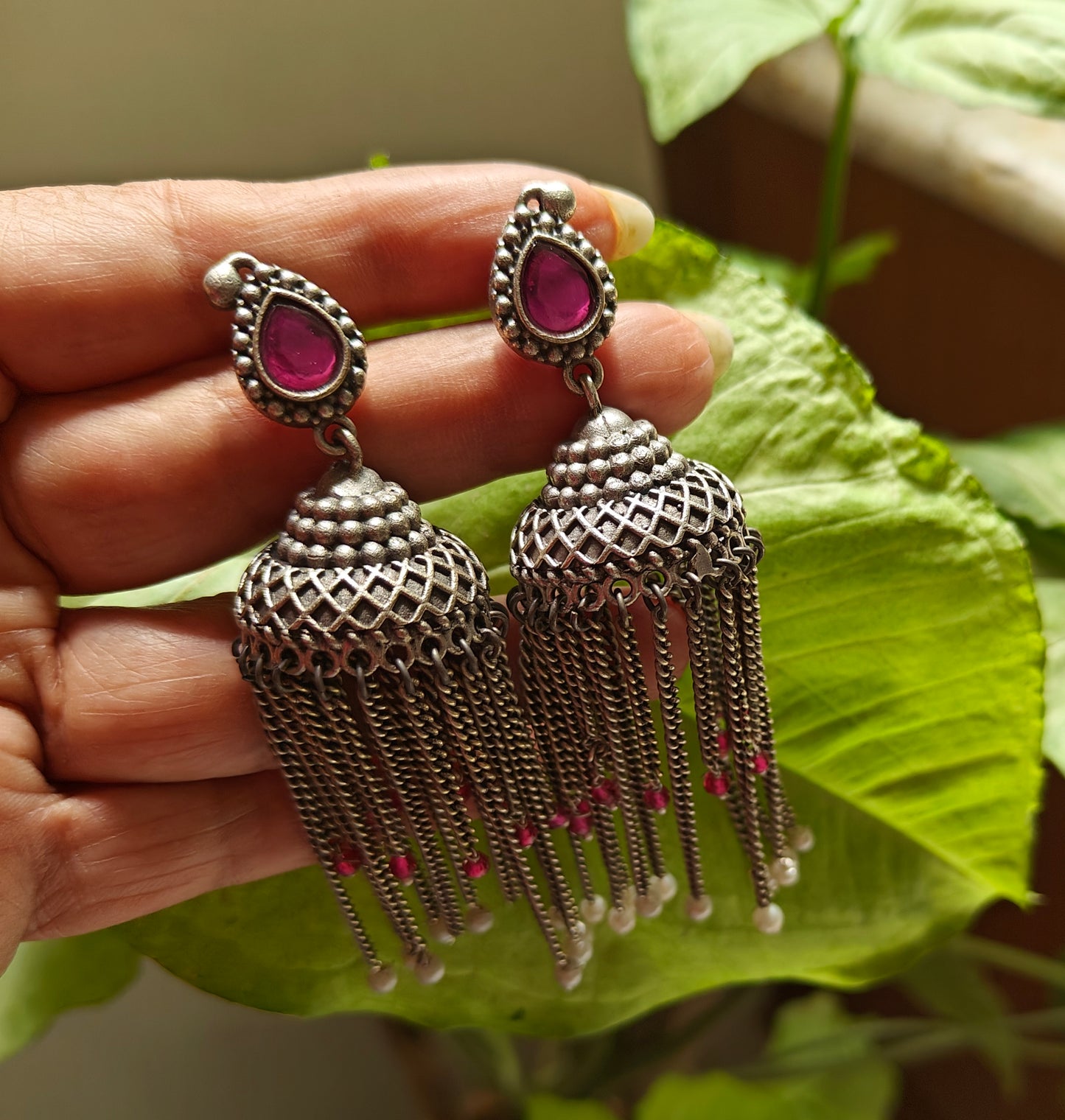 Jhumkas(earrings)with chain hangings