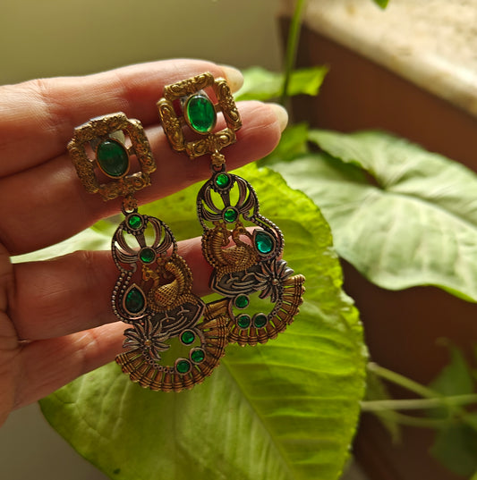 Dual tone earrings with emerald green/sapphire blue stone inlay