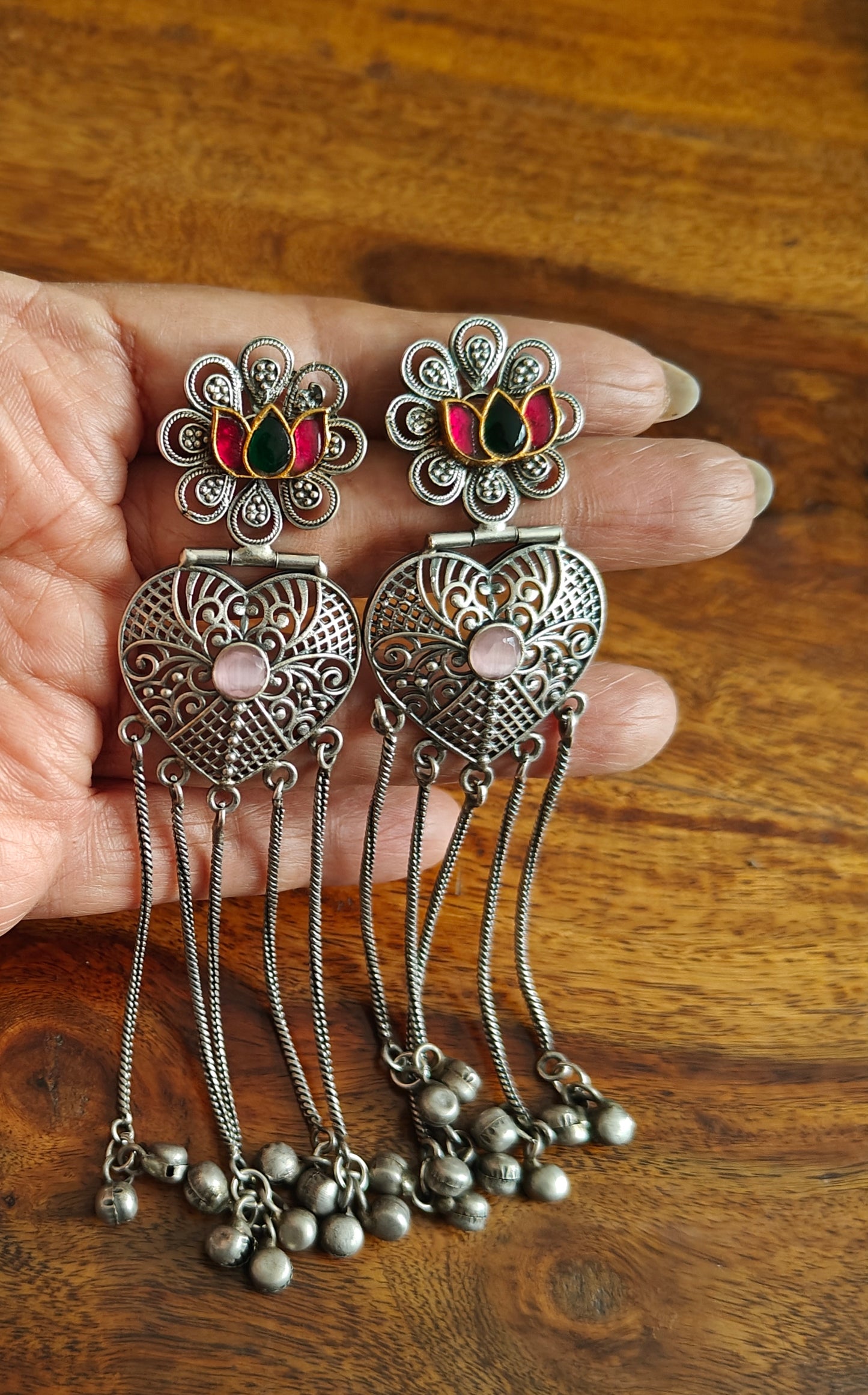 Dual tone earrings with lotus and hangings