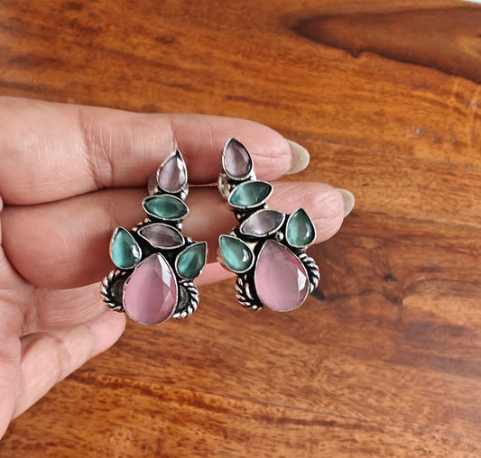 Stone earrings with enhancement