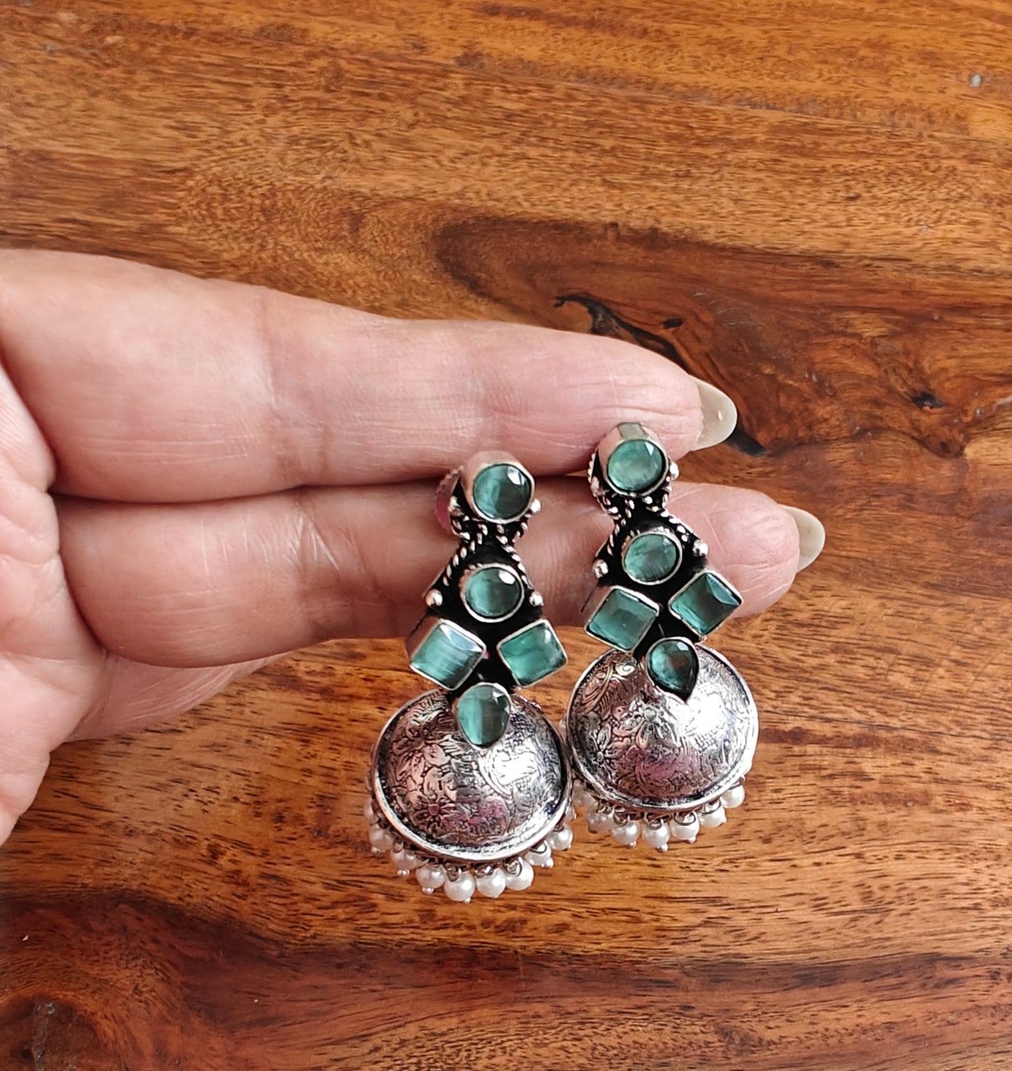 Stone earrings with jhumkis below