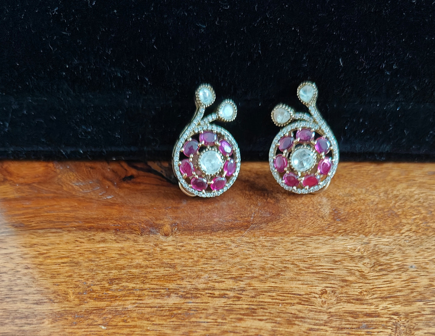 Swagata set with Ruby red stones and moissanite flowers on top