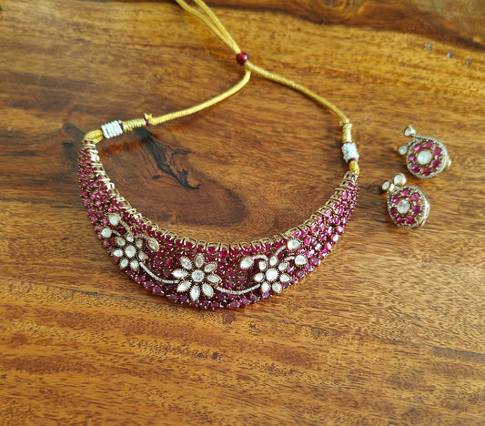Swagata set with Ruby red stones and moissanite flowers on top