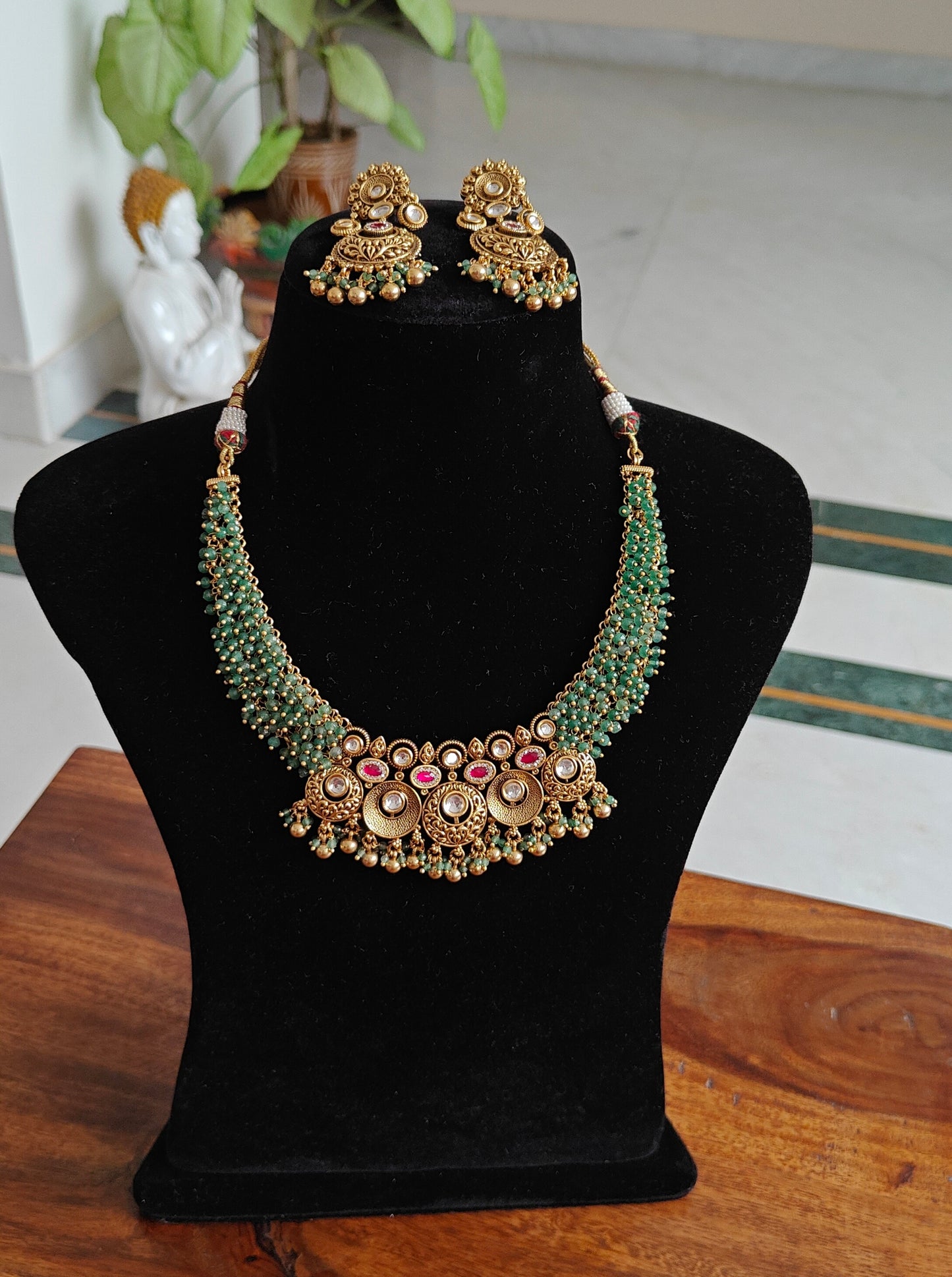 Sachika set with gold moissanite,and stones