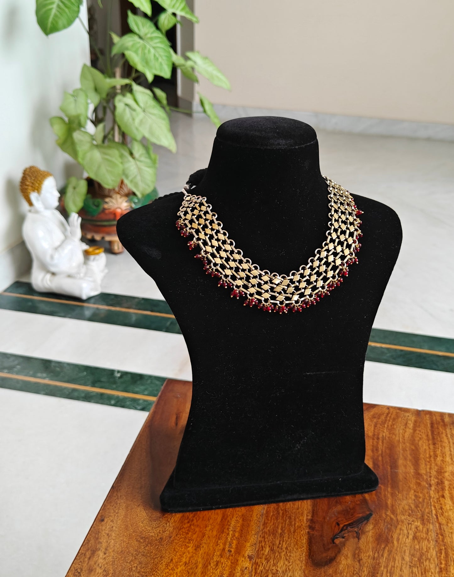 Chaya dual tone necklace with red bead hangings