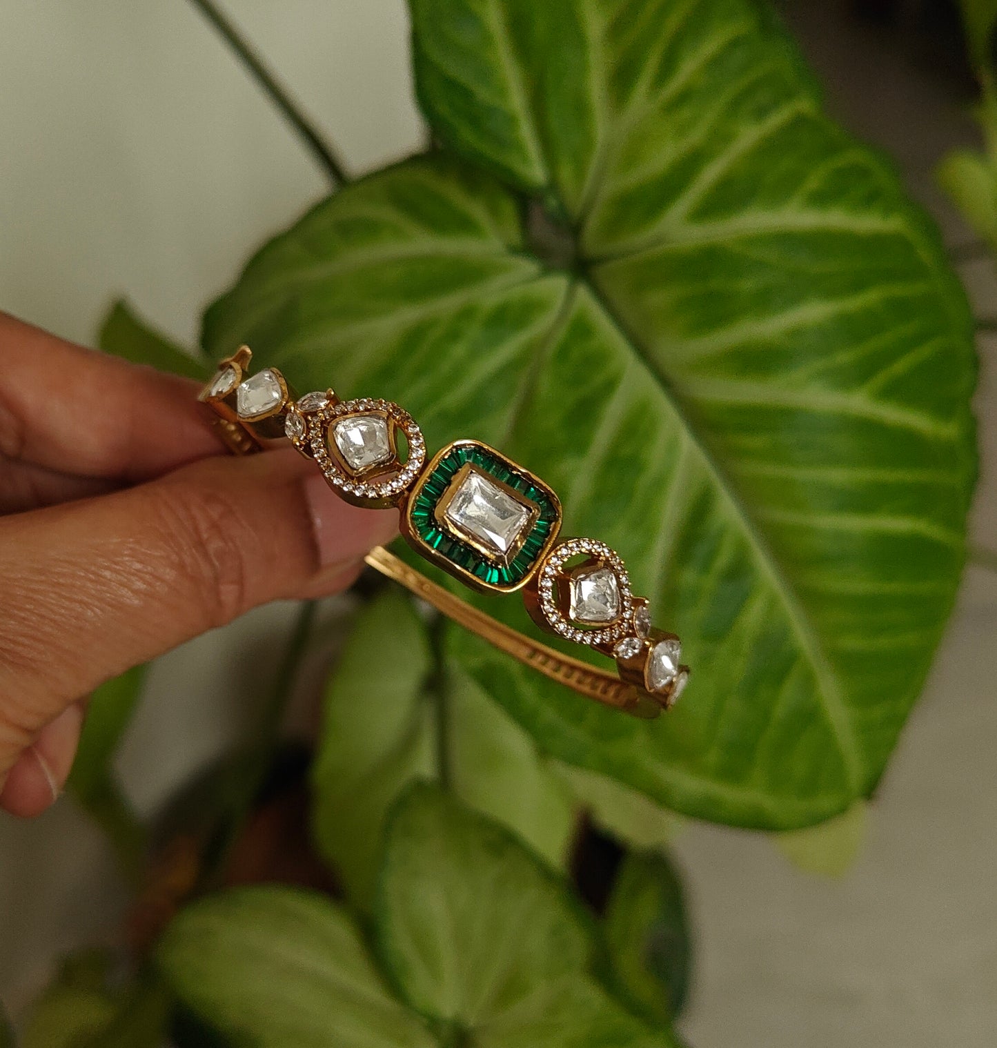 Moissanite kada with green/pink stone around centre piece