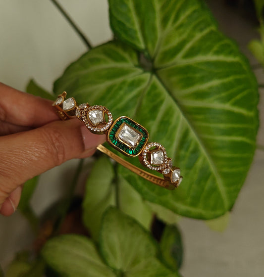 Moissanite kada with green/pink stone around centre piece
