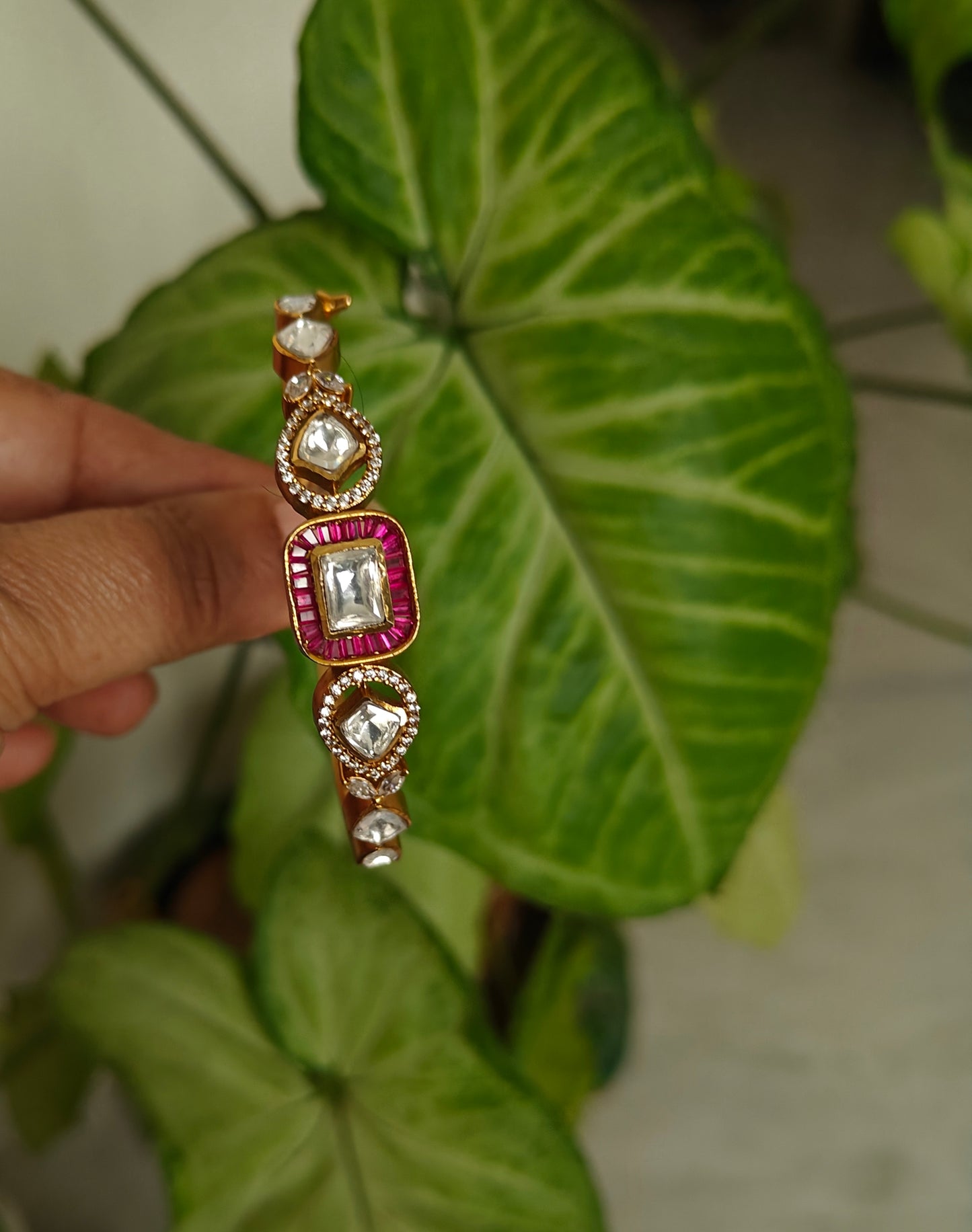 Moissanite kada with green/pink stone around centre piece
