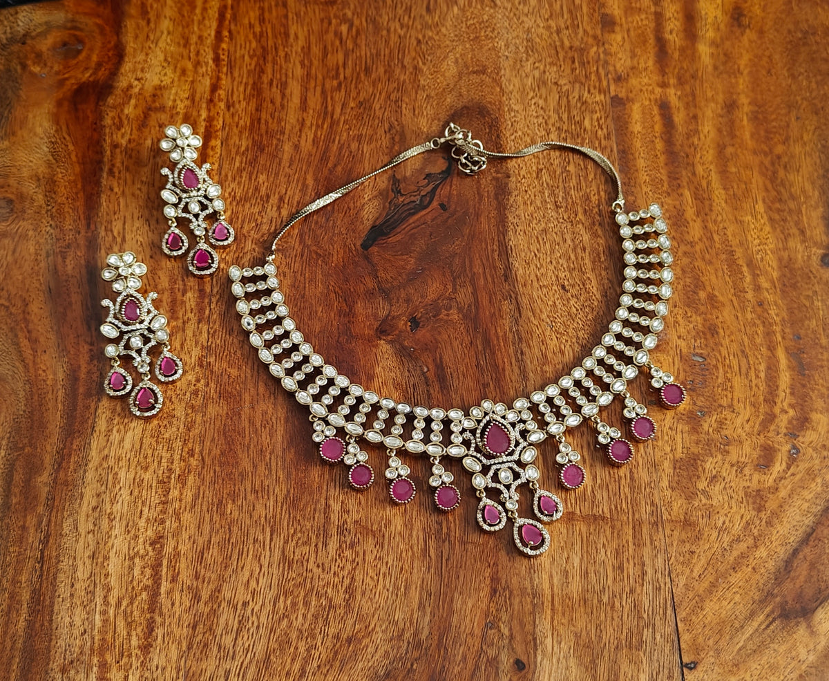 Tapani set with moissanite pieces on neck piece and stones hanging below