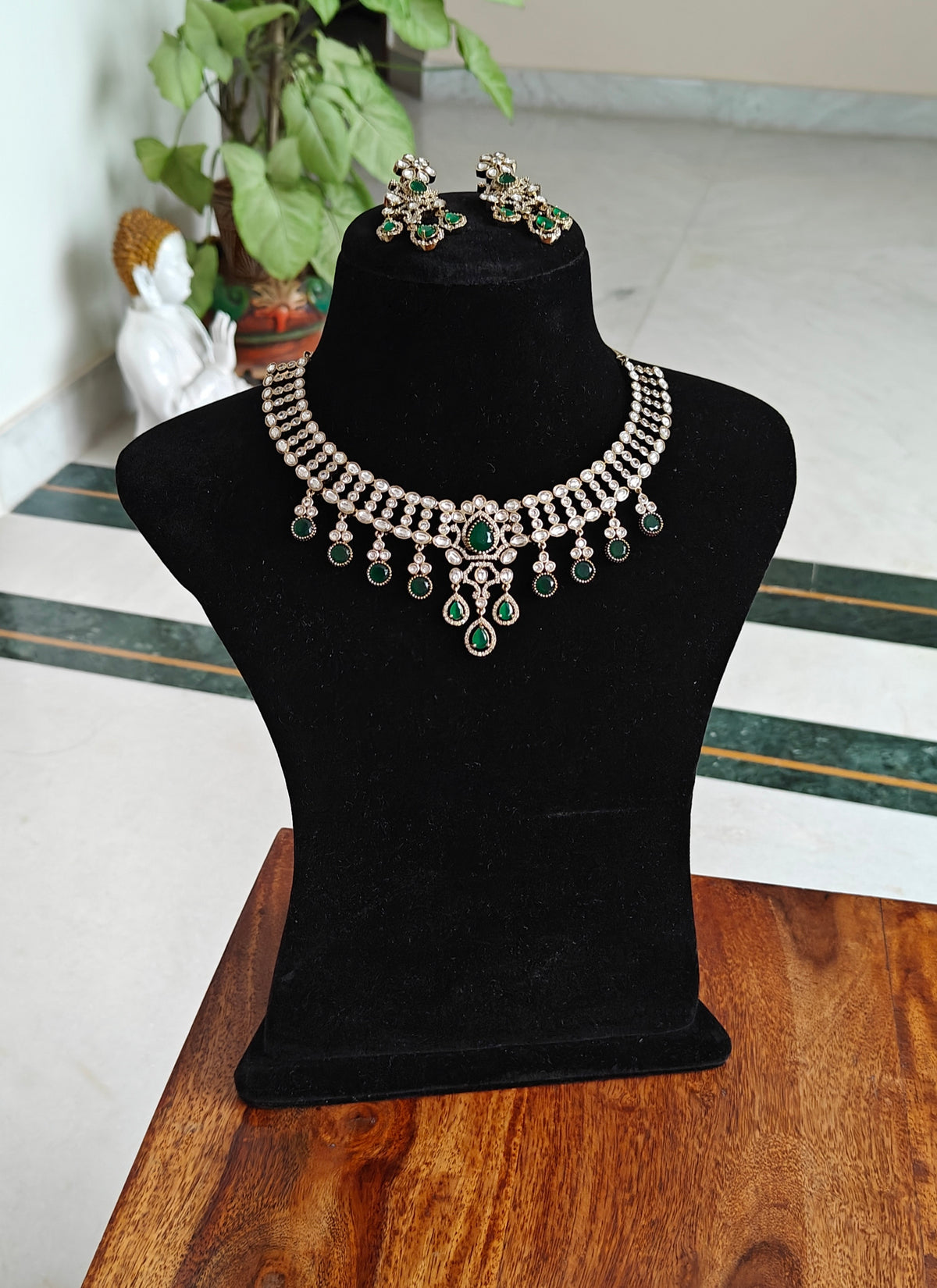 Tapani set with moissanite pieces on neck piece and stones hanging below