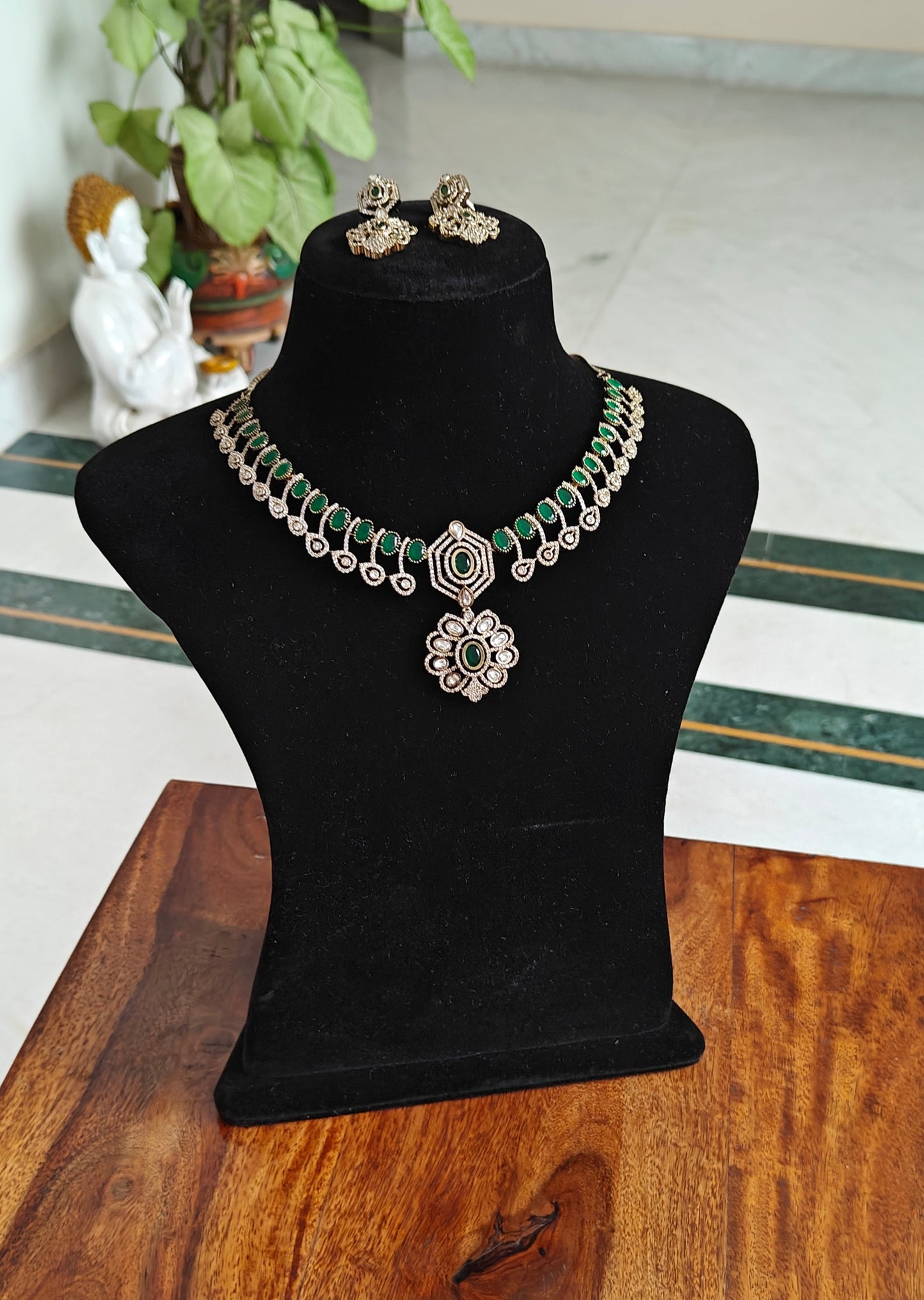 Sameena set with stones and a flower pendant below