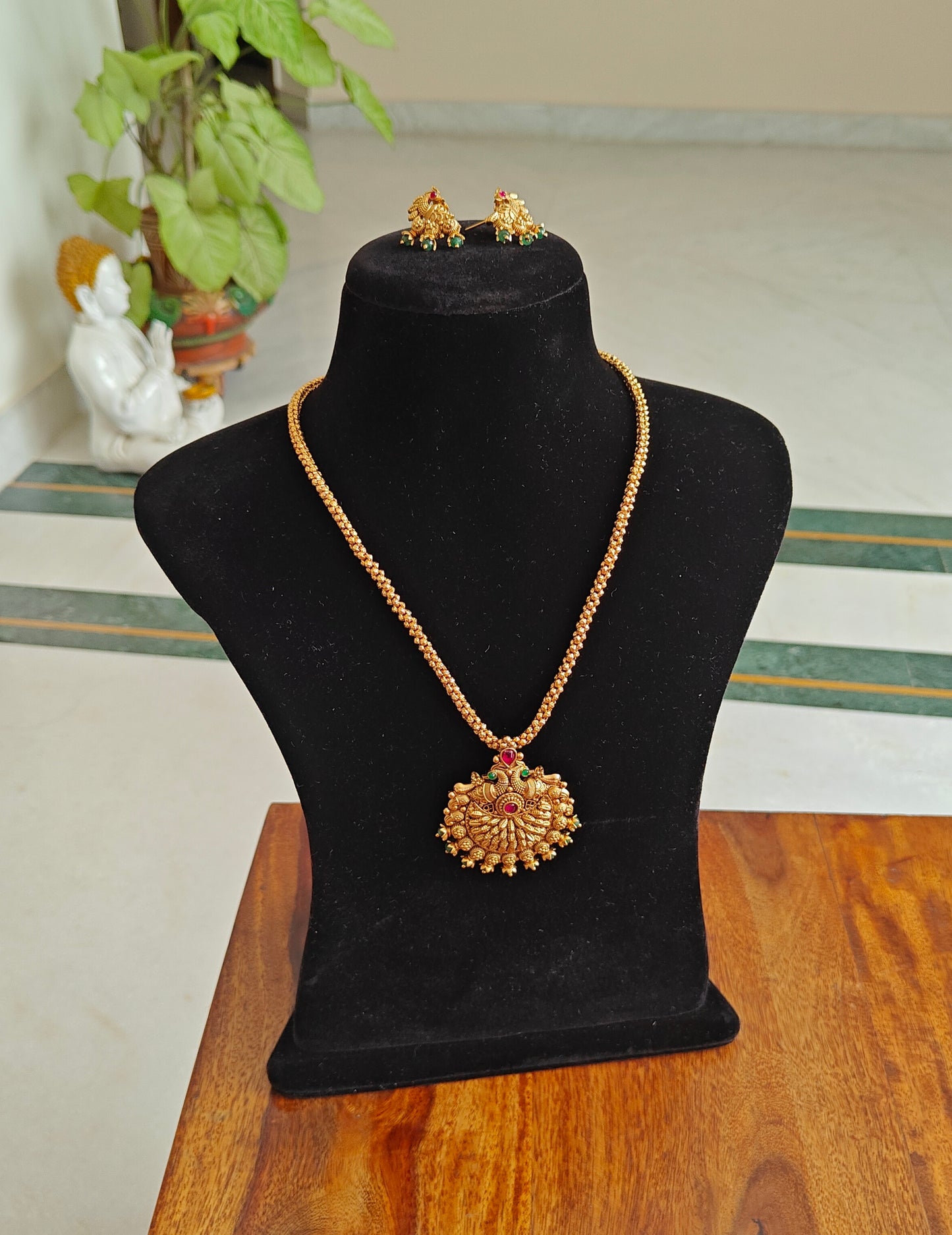Swarnmala set with peacock motif