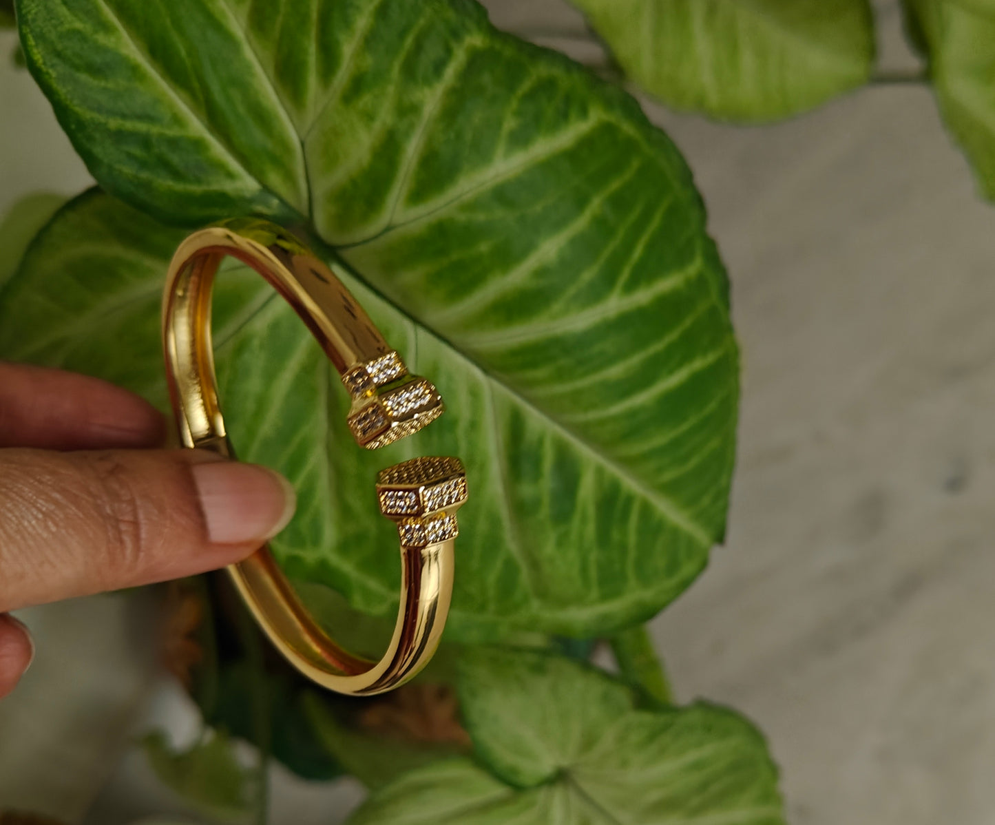 Bracelet with cz on end of rombus