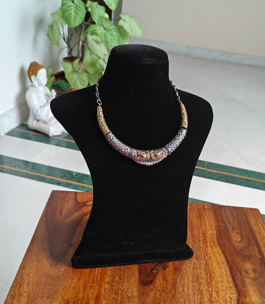 Dual tone choker with peacock engraving in centre