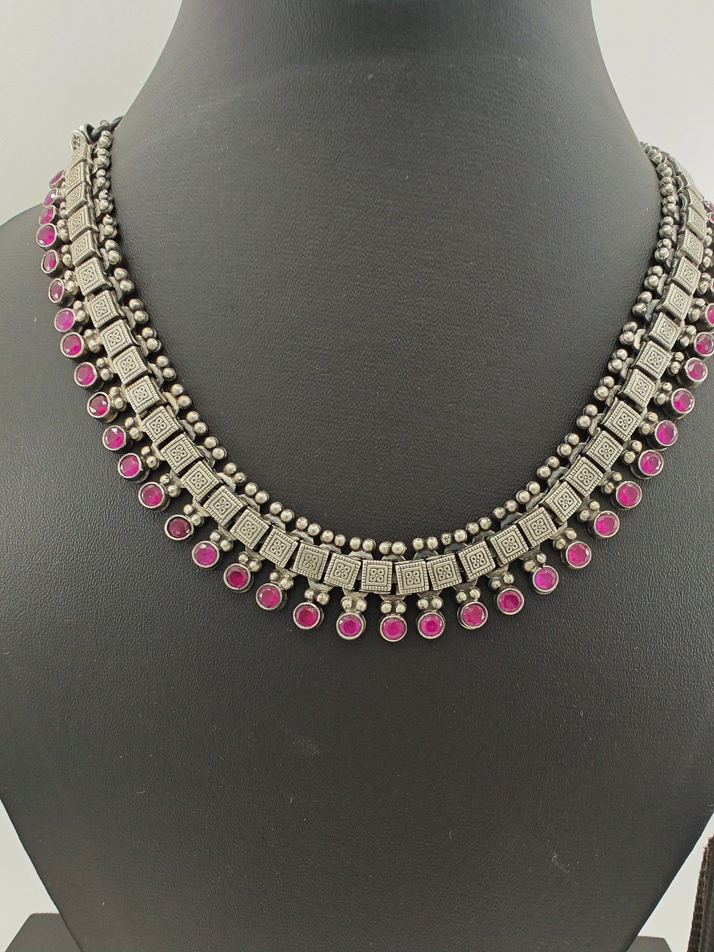 Silver necklace with pink ruby stone