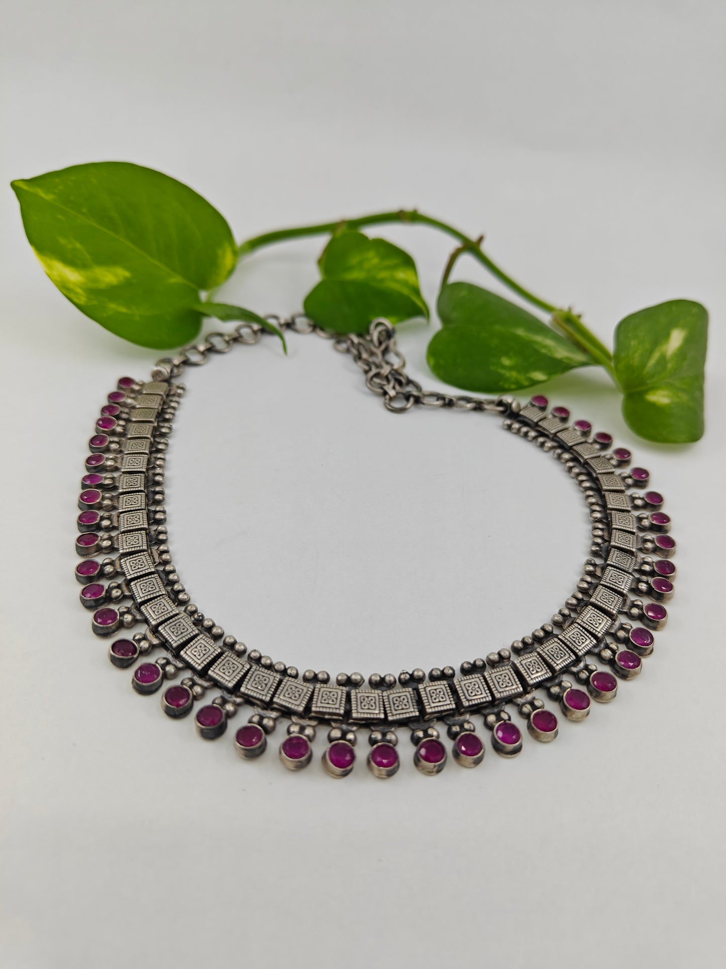 Silver necklace with pink ruby stone