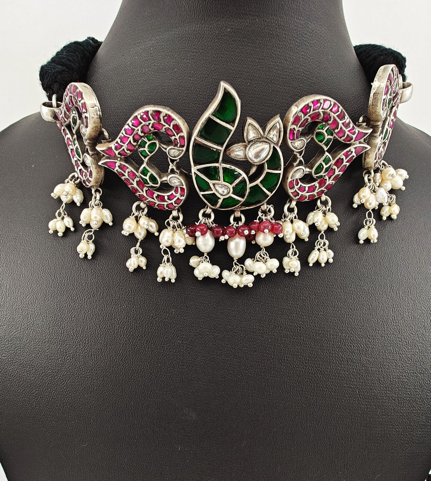 Silver chocker necklace with peacock motif