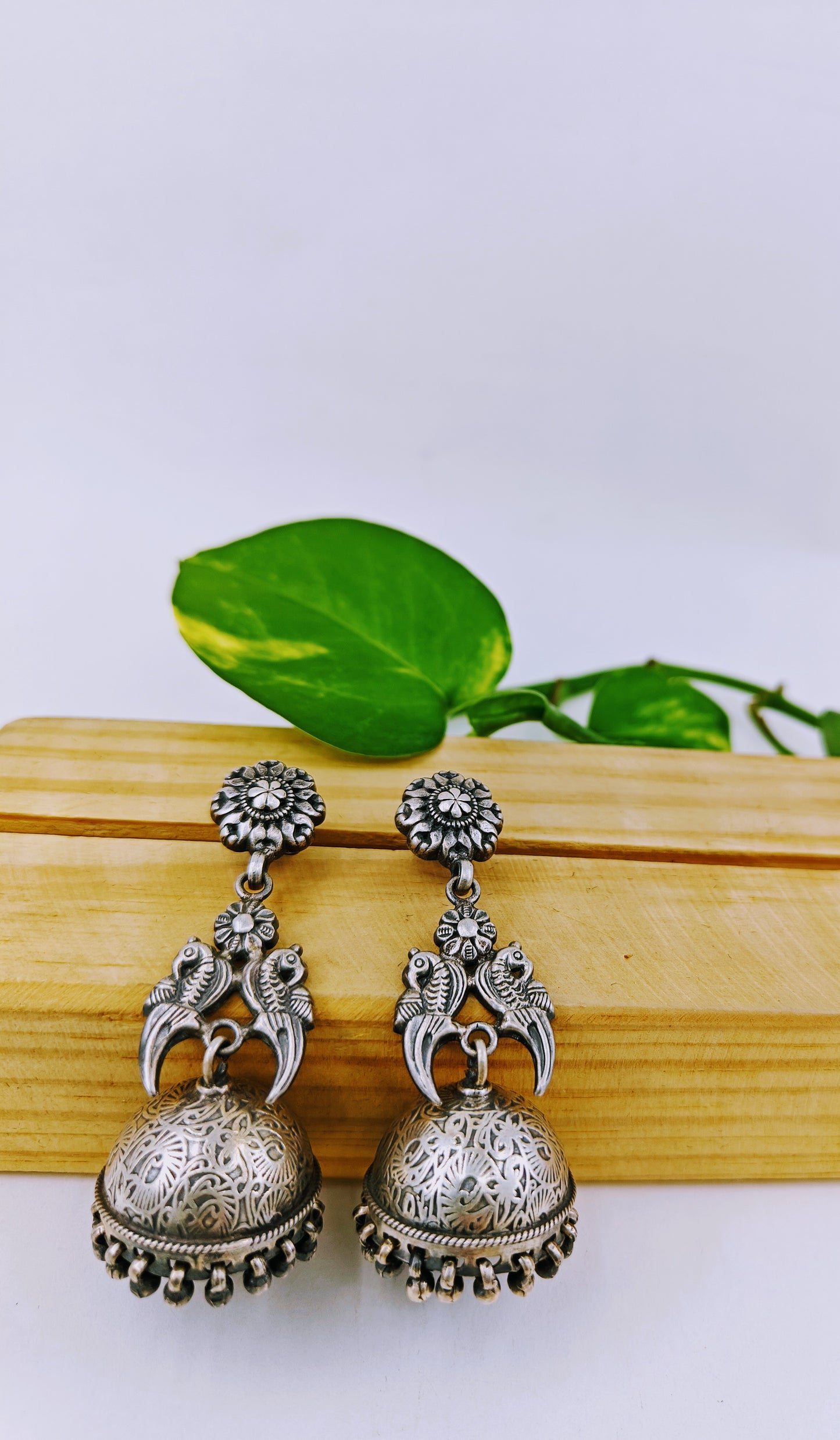 Silver jhumkas earrings with parrot design