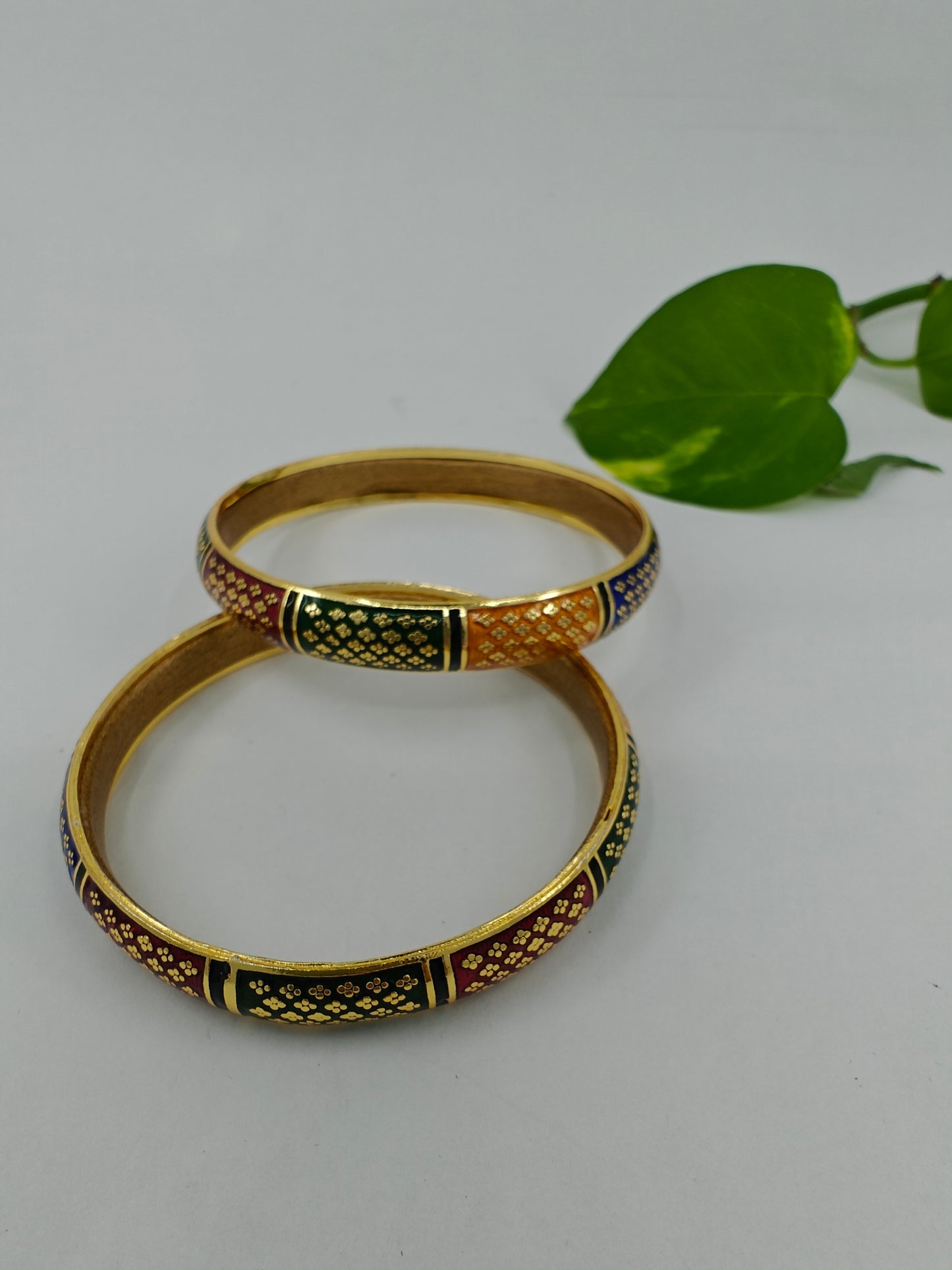 Golden bangles with meenakari in red,yellow,blue,green(2 pcs)