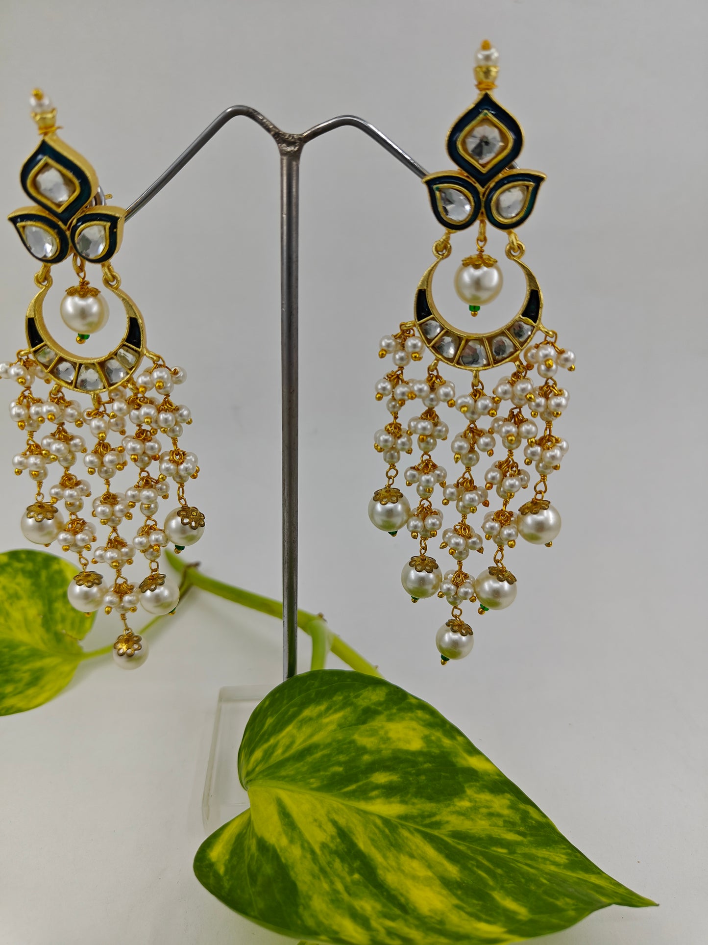 Gold finish kundan earrings with blue/teal green meenakari with pearl haangings