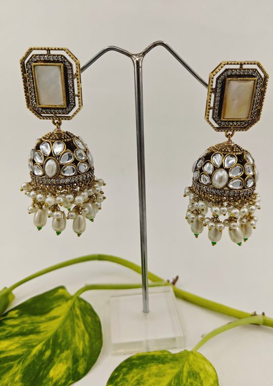 Jhumkas( earrings) in antique finish with kundan and coloured stone