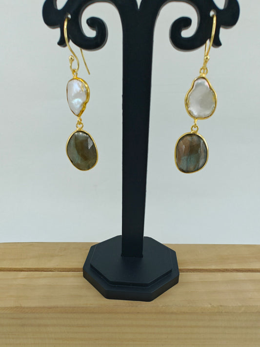 Golden danglers (earrings) with a baraque pearl on top and labradorite stone at bottom