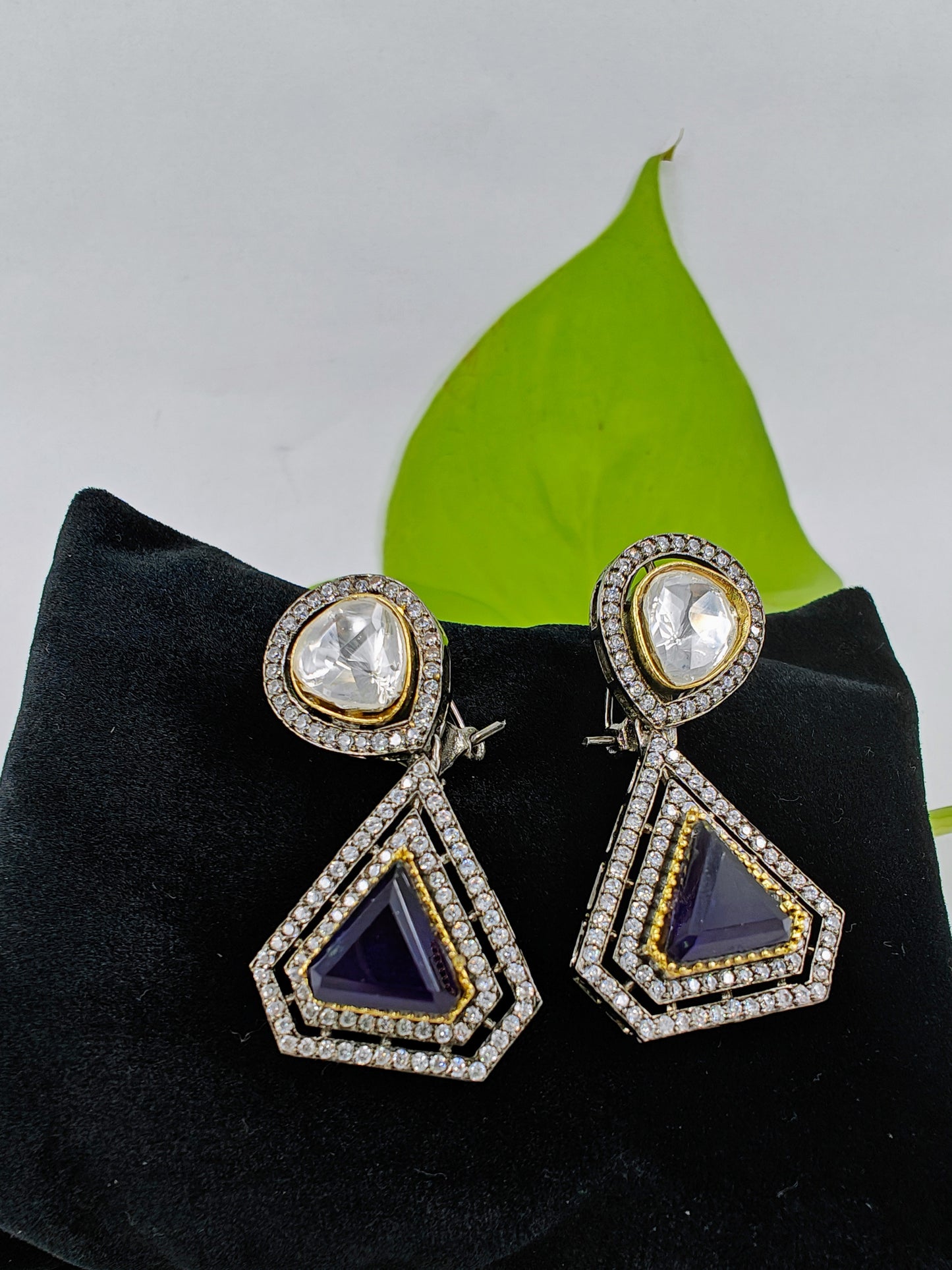 Earrings in Kundan and Topaz/Sapphire stone and CZ detailing