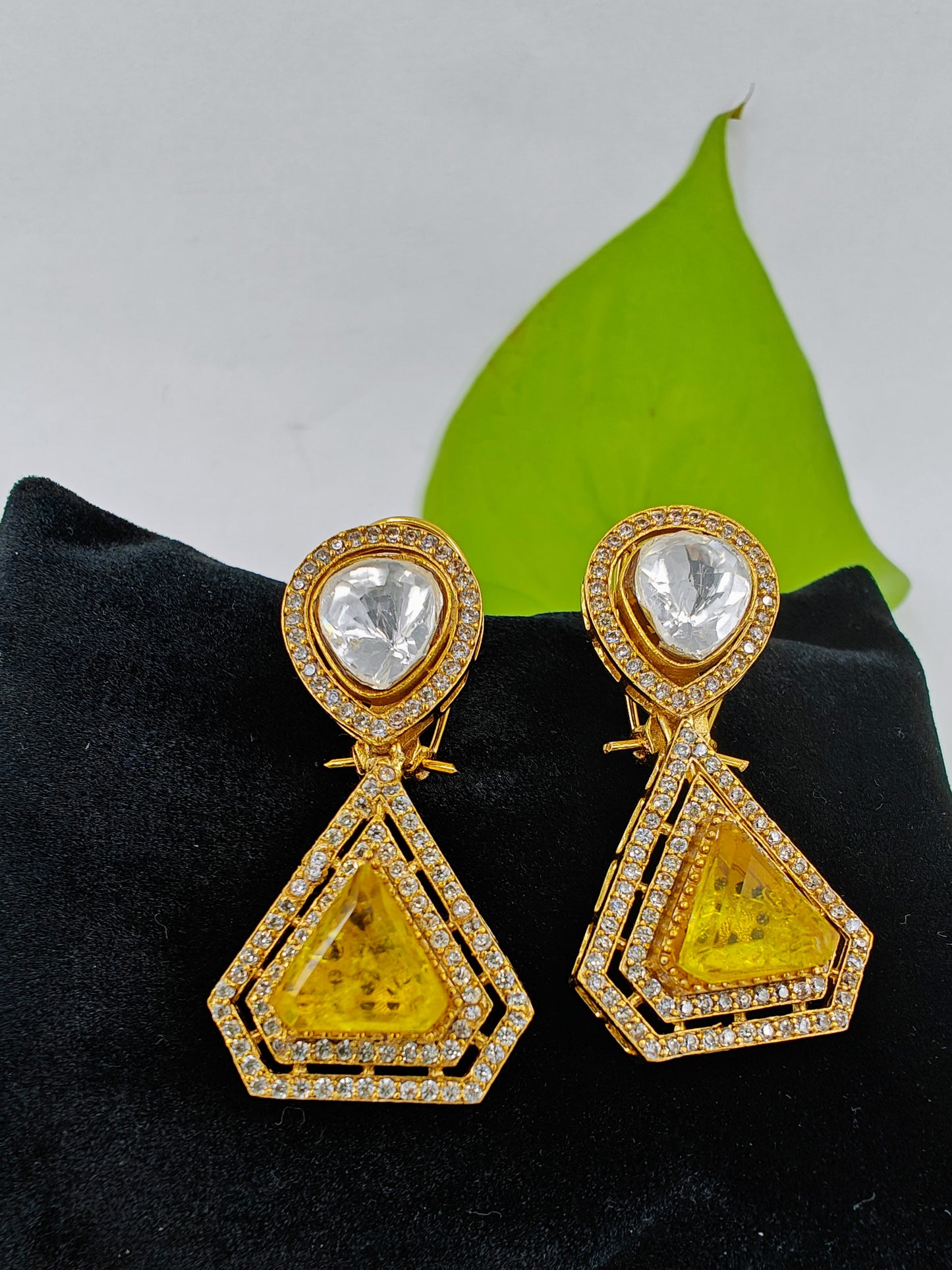 Earrings in Kundan and Topaz/Sapphire stone and CZ detailing