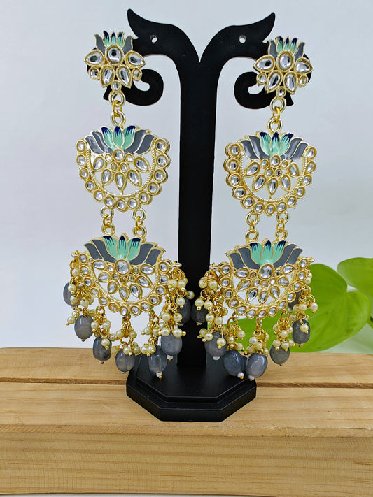 Earrings in golden finish with three lotus flowers in grey meenakari and kundan