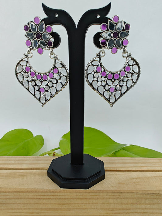 Silver hangings (earrings) with pink and clear stone on heart shaped piece on flower stud