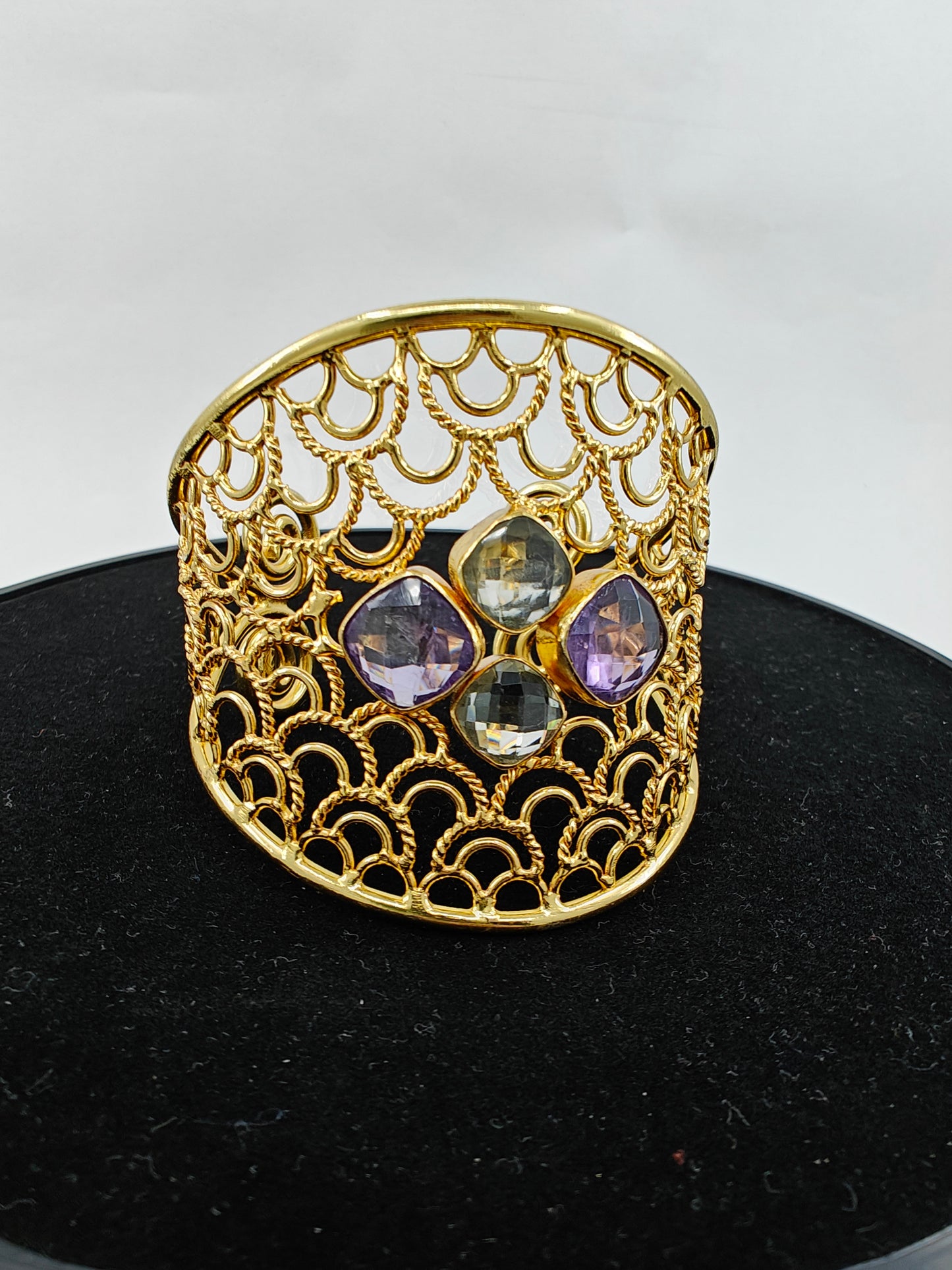 Kuff/ Bangle in gold finish with jali work and stones in centre