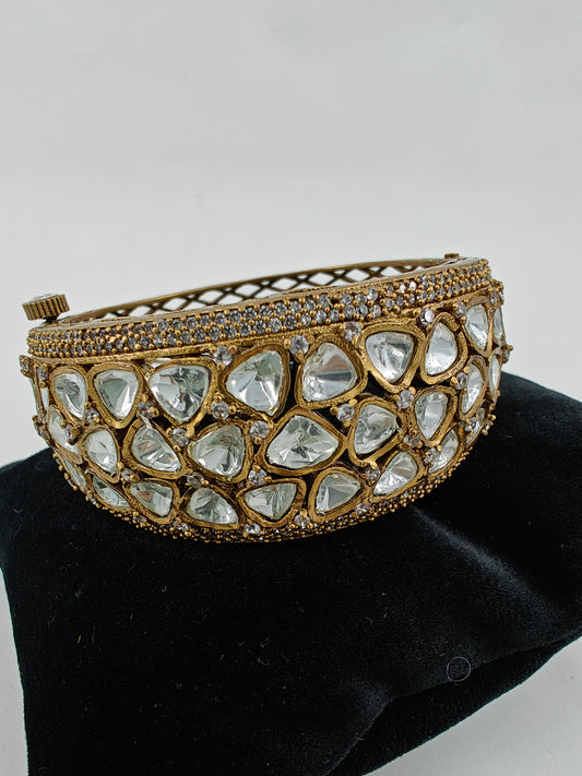 Kara( bangle) in antique finish with kundan inlay in three layers,openable screw design