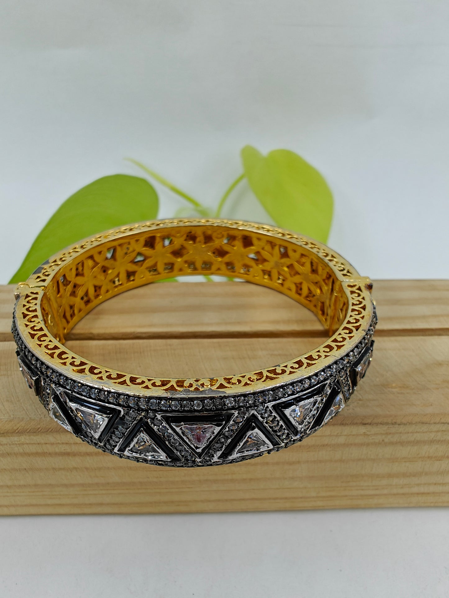 Kara( bangle) with triangular kundan and CZ on black meenakari