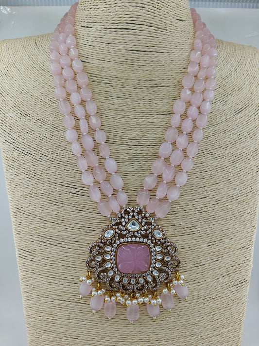 Antique finish set with kundan CZ and pink/ grey stone on pink and grey strands,matching earrings