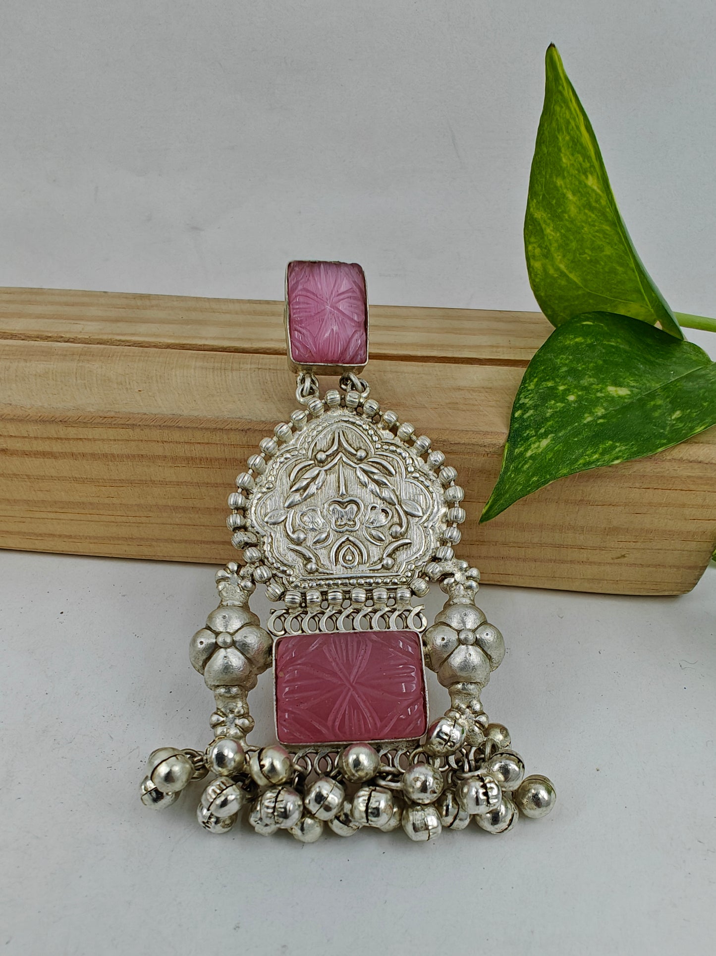 Big earrings with carvings,pink stone and ghungroos