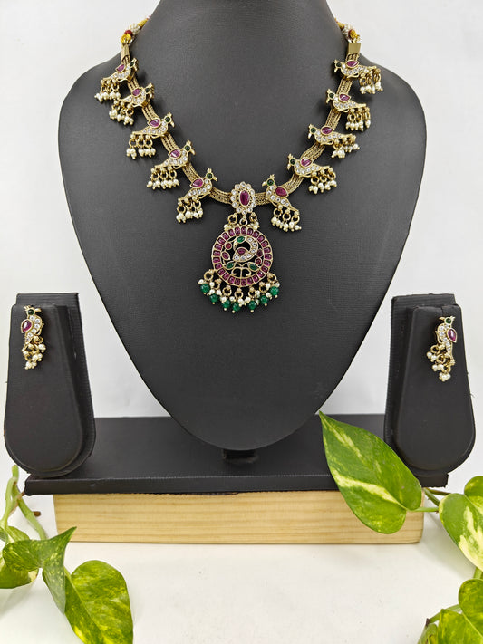 'Parindey' set with stone studded birds perched on a woven flat chain necklace