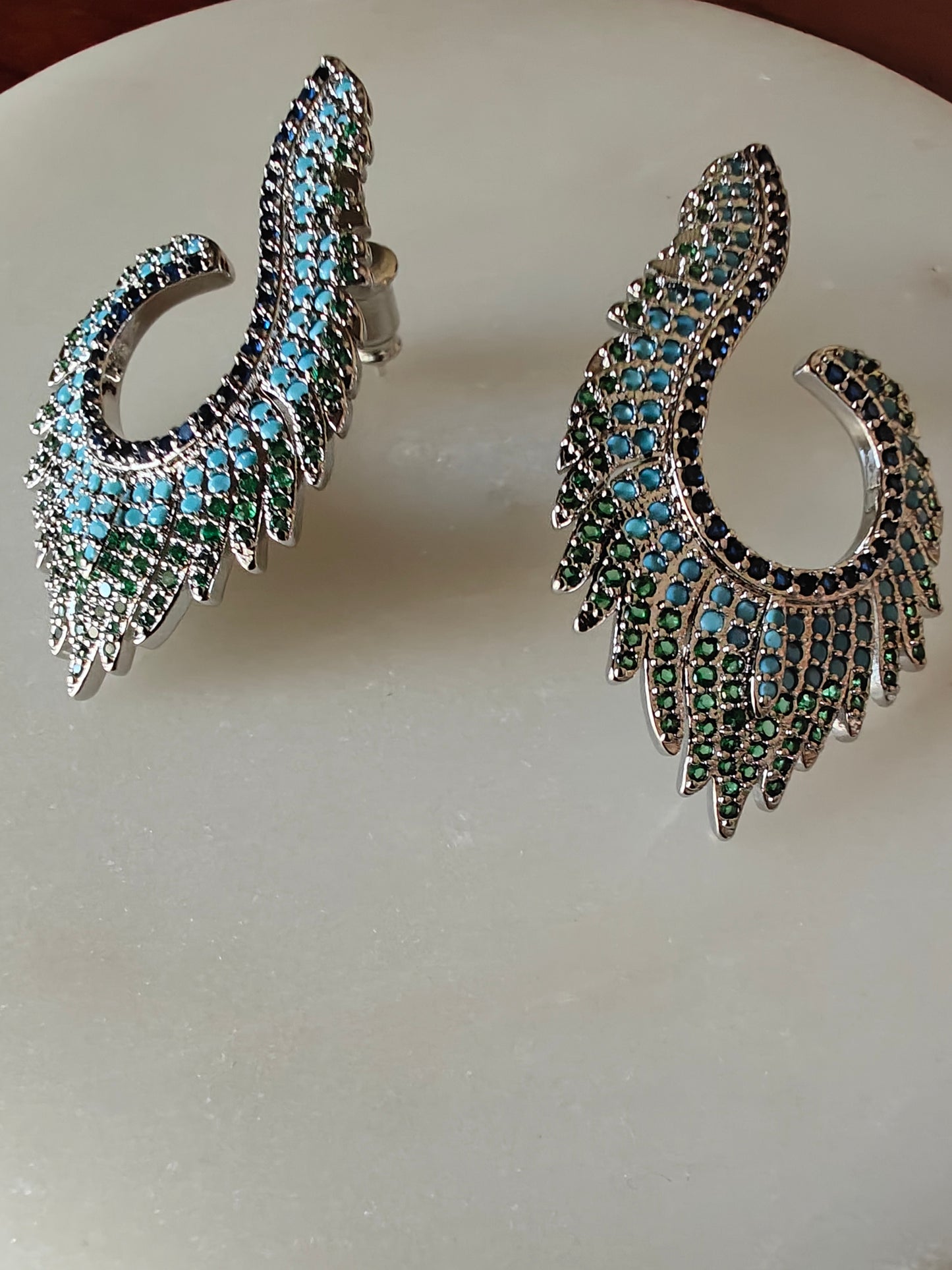 Moor pankhi earrings with nano stones,blue sapphire stones along the inner edge