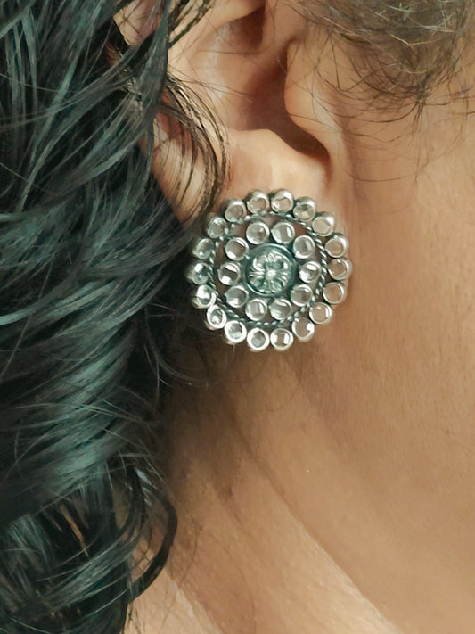 Silver stud (earrings) in flower design, round petals with clear stone in concentric circles