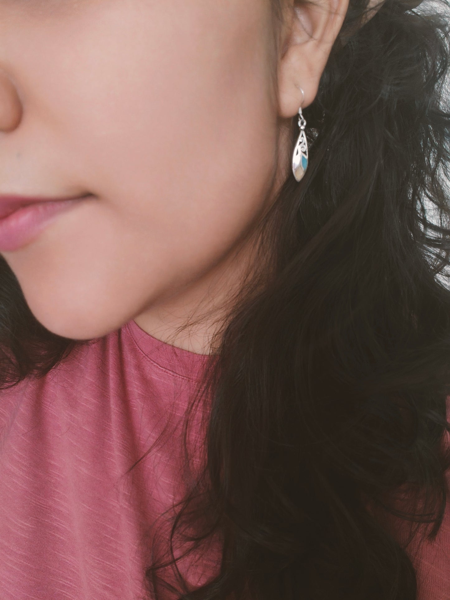 Elliptical silver earrings with carvings and pastel coloured stones