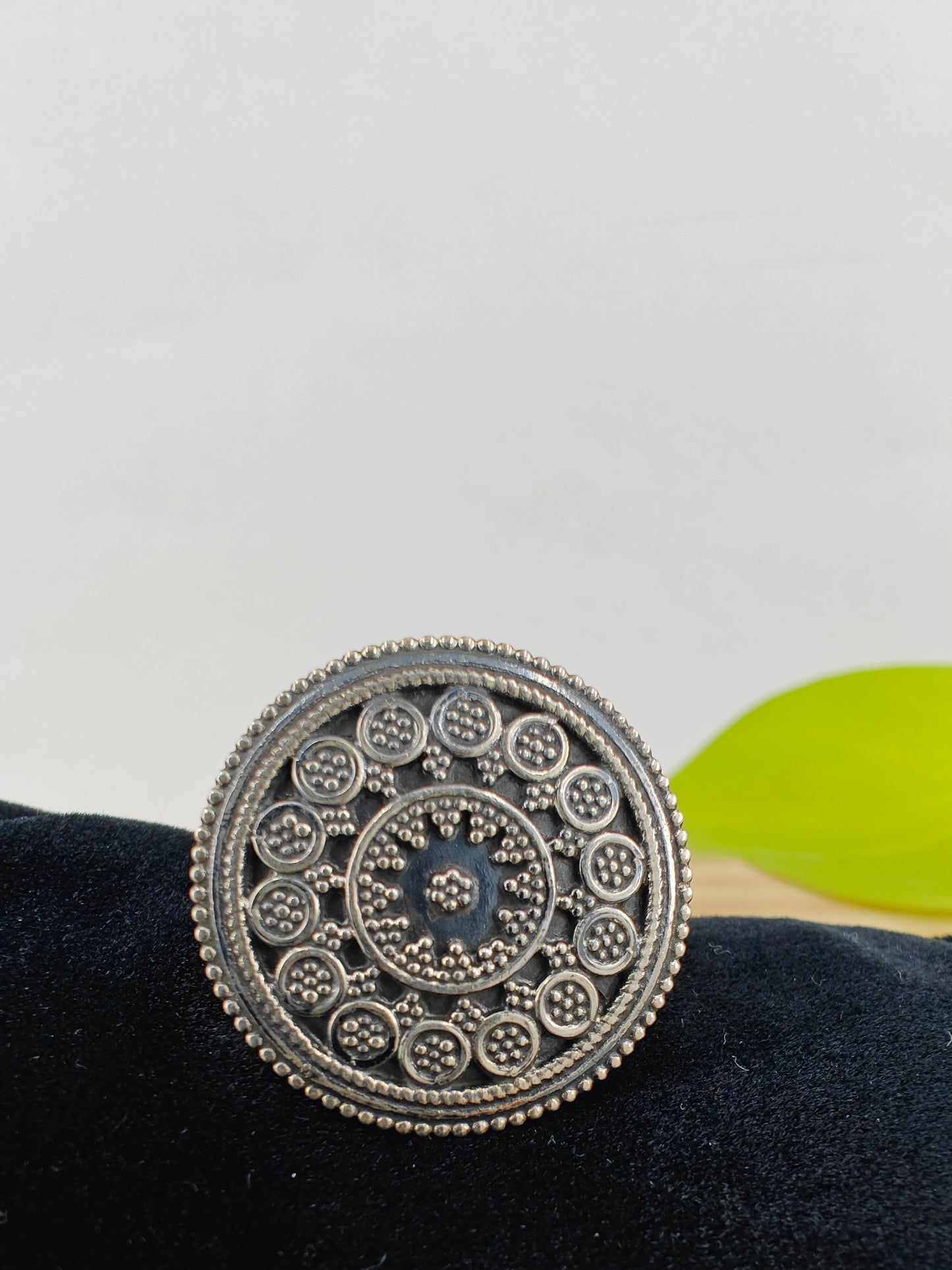 Round silver ring with carvings